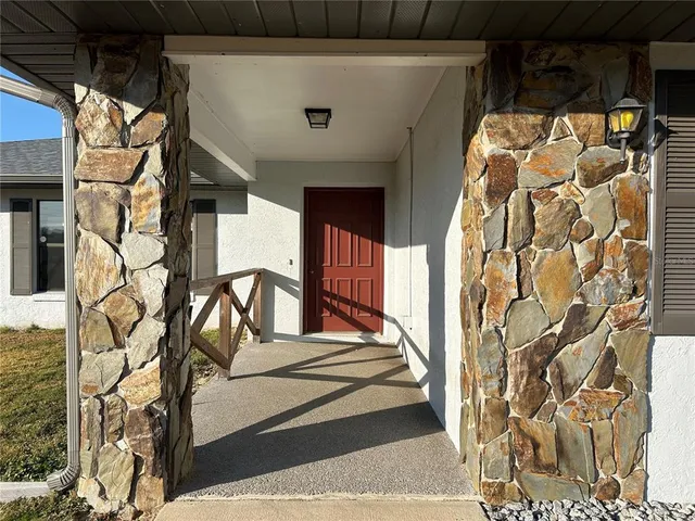 a view of a backyard with a lake view