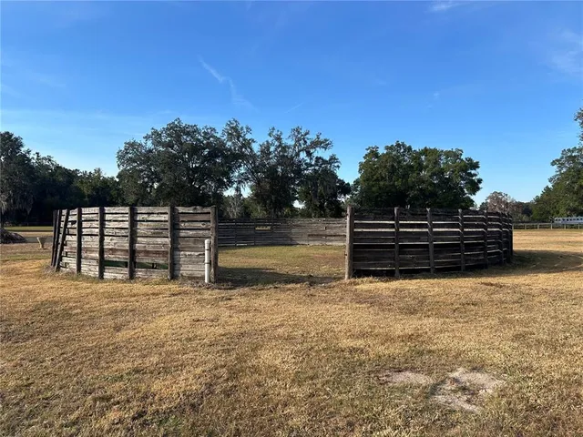 a view of an ocean and a yard