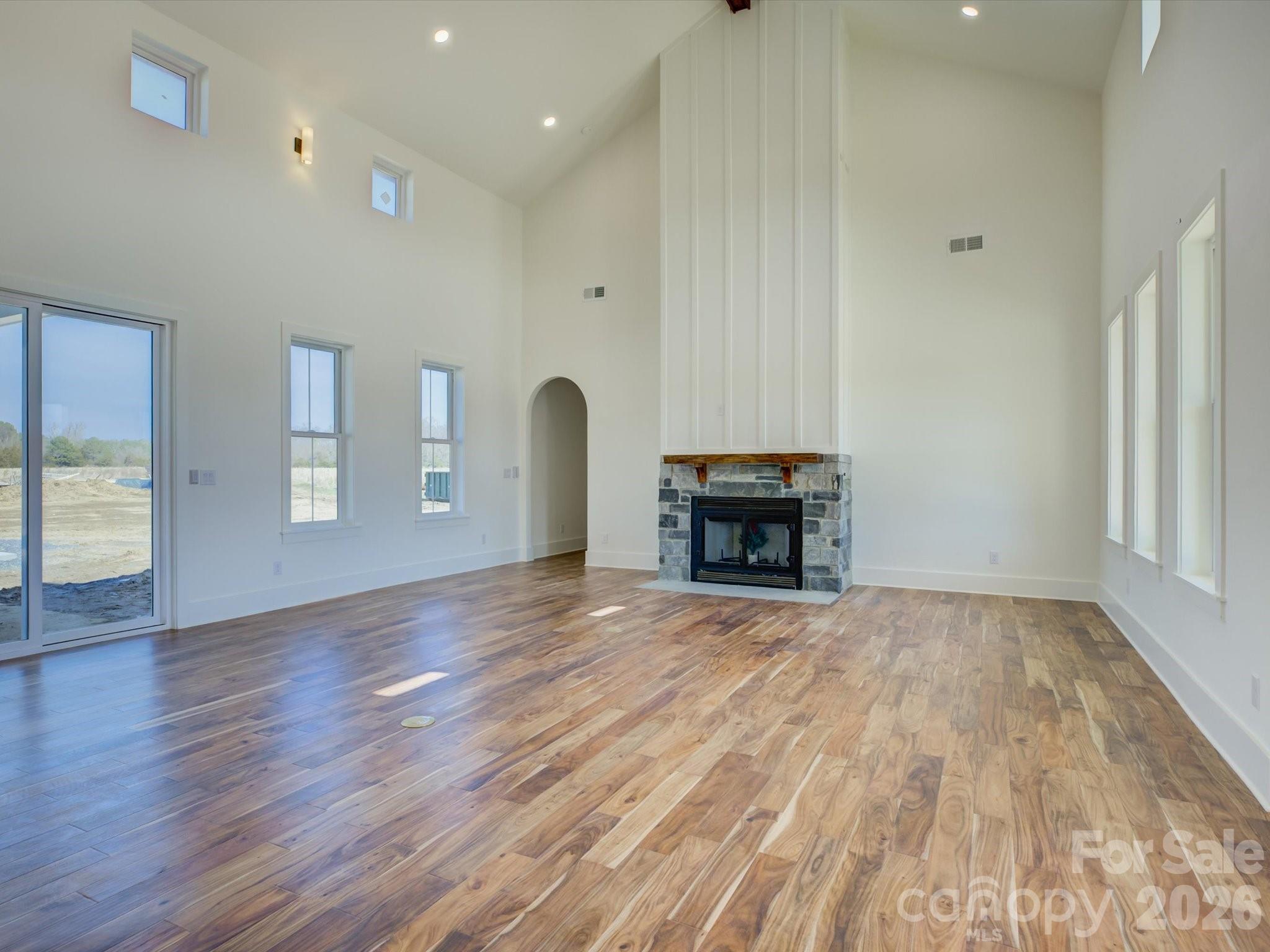 2334 Bridgewater Road, Unit 6 Rock Hill, SC 29730 - Photo 17 of 47 a view of empty room with wooden floor and fireplace