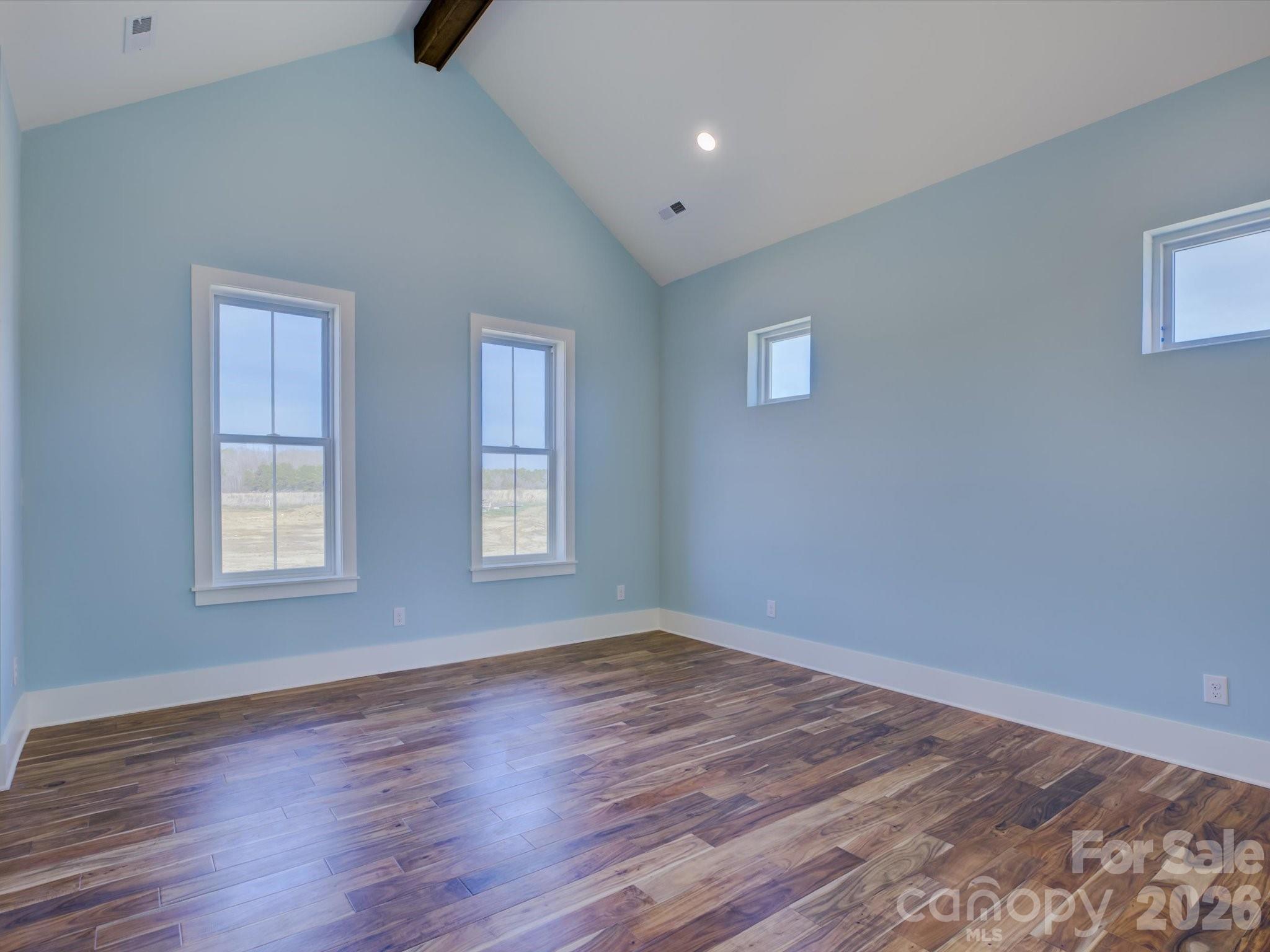2334 Bridgewater Road, Unit 6 Rock Hill, SC 29730 - Photo 20 of 47 a view of an empty room with wooden floor and a window
