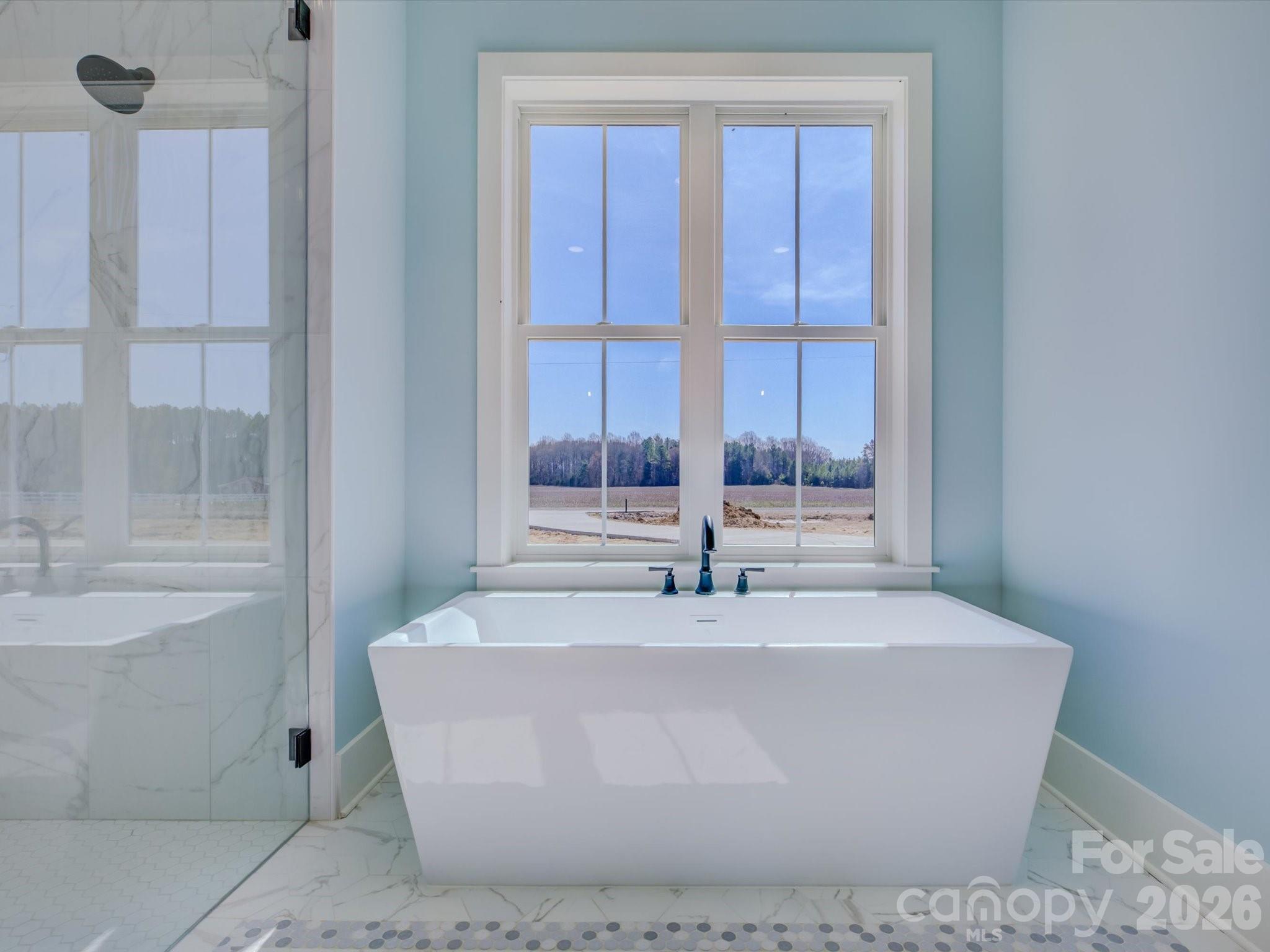 2334 Bridgewater Road, Unit 6 Rock Hill, SC 29730 - Photo 24 of 47 a white bath tub sitting in a bathroom