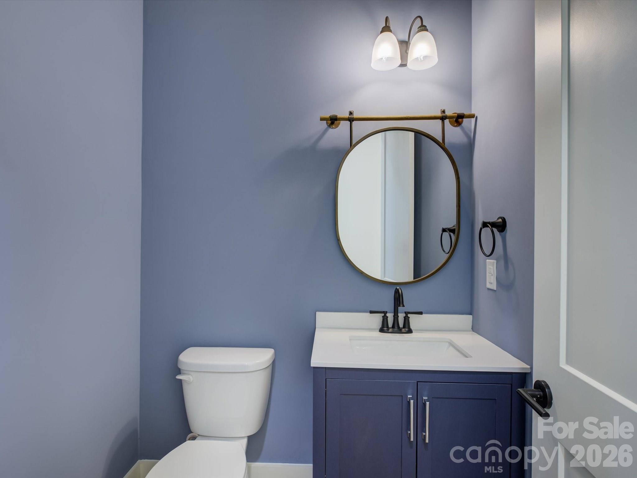 2334 Bridgewater Road, Unit 6 Rock Hill, SC 29730 - Photo 28 of 47 a bathroom with a toilet a sink and mirror