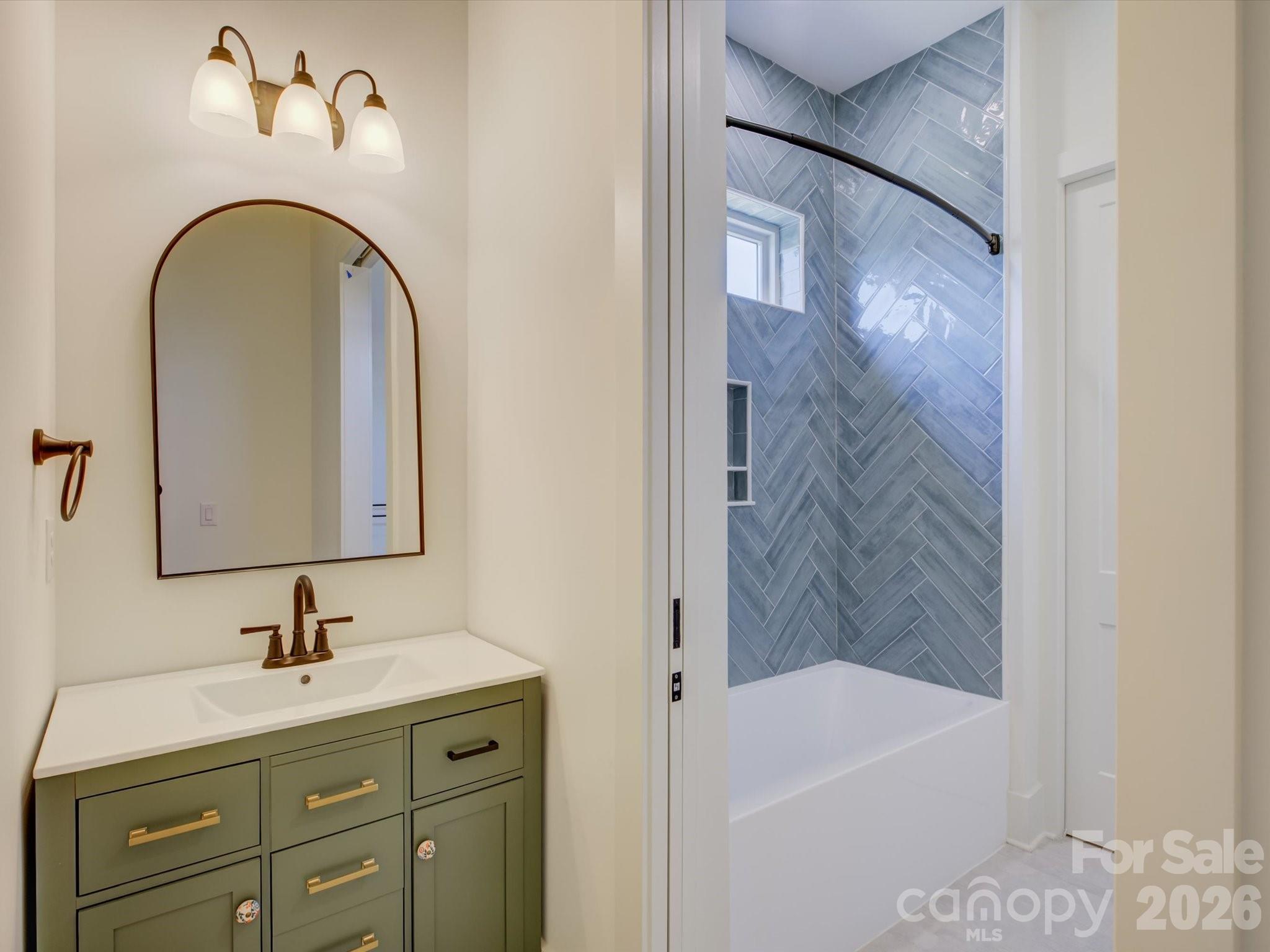 2334 Bridgewater Road, Unit 6 Rock Hill, SC 29730 - Photo 36 of 47 a bathroom with a granite countertop sink a mirror a shower and a bathtub
