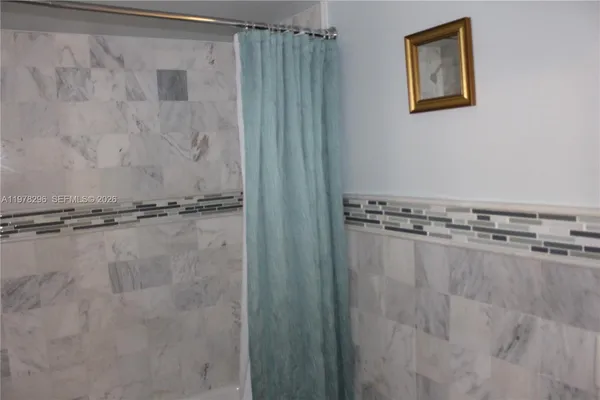 a close view of a shower in a bathroom