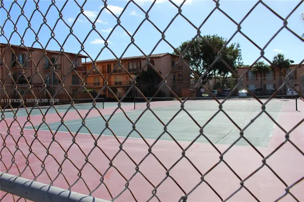 a black and white wall in a backyard