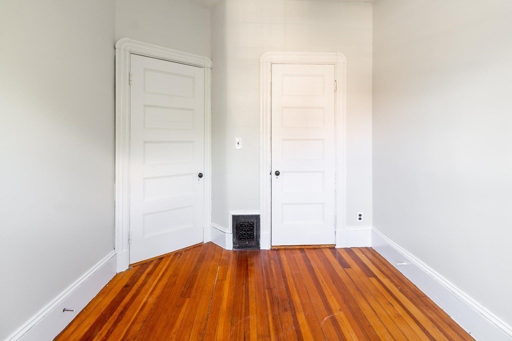 789 Columbia Road, Unit 2 Boston, MA 02125 - Photo 12 of 19 a view of a room with wooden floor