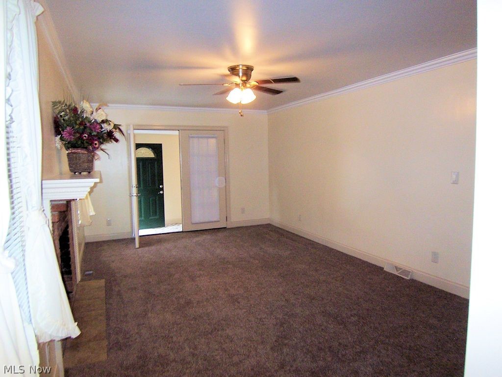 6857 Chestnut-Ridge Road Hubbard, OH 44425 - Photo 9 of 27 Living room features french drs to breezway