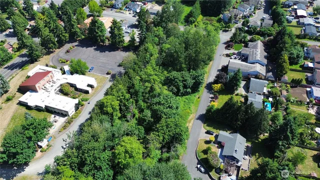 an aerial view of residential house with outdoor space