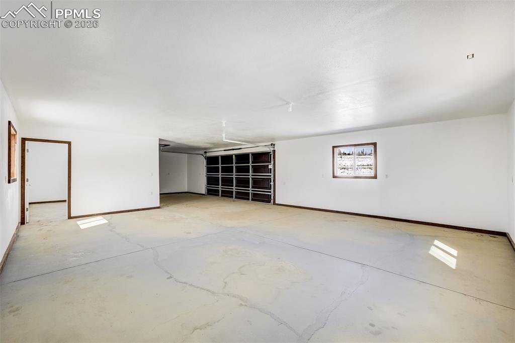 538 Remington Road Como, CO 80432 - Photo 9 of 19 an empty room with a empty space and windows