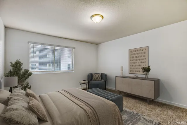 a bathroom with a double vanity sink toilet and a mirror