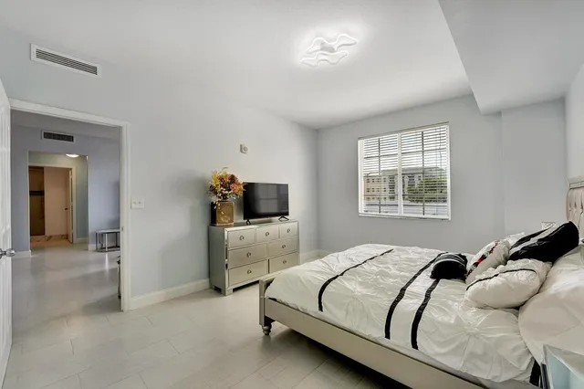 a bathroom with a tub and shower