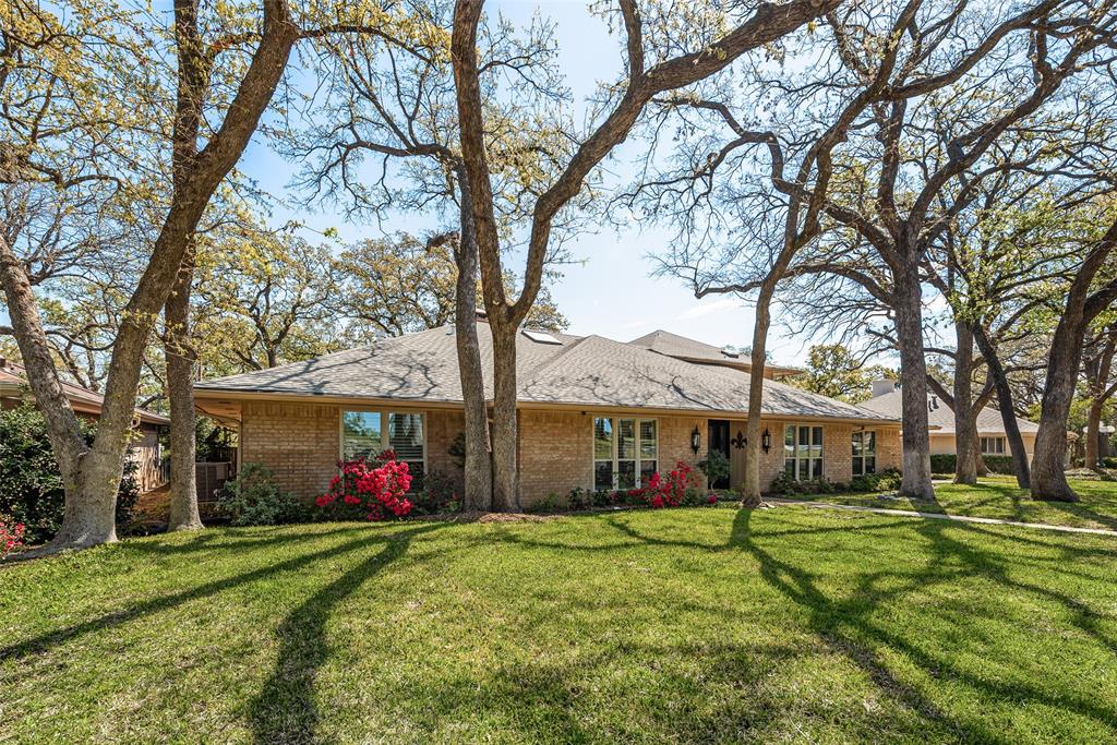 805 Crowley Road Arlington, TX 76012 - Photo 30 of 30 a front view of a house with garden