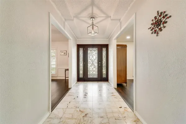 a view of entryway with a hallway
