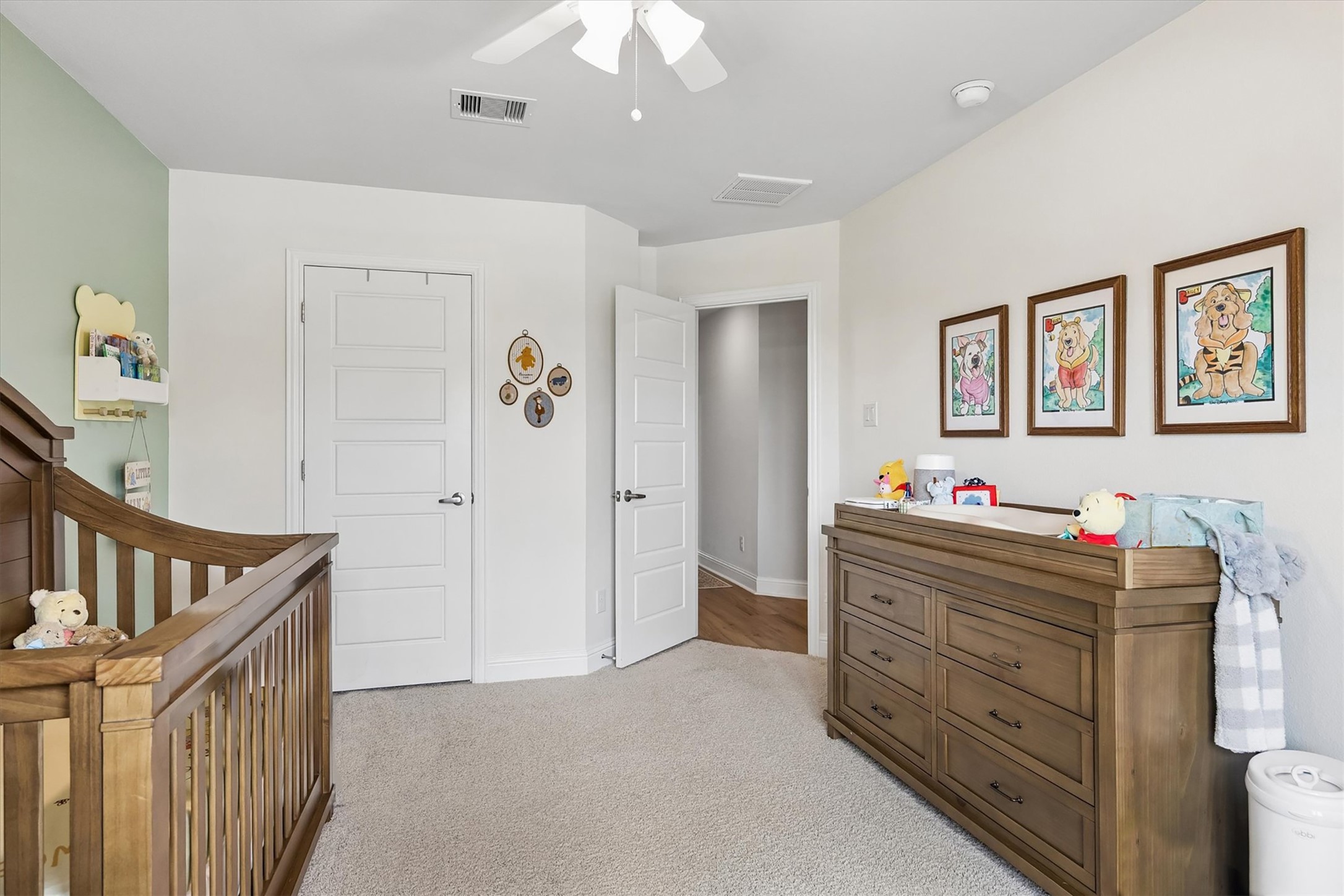 10227 Whitney Reach Drive Rosharon, TX 77583 - Photo 23 of 28 View of secondary room toward planked flooring hallway.