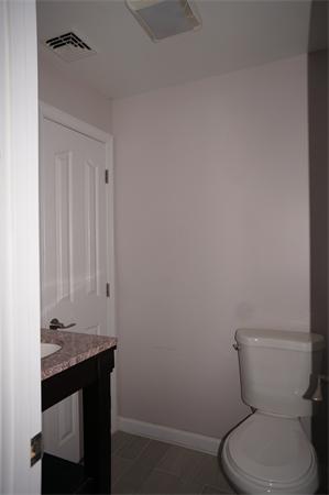 120 Navajo Road Springfield, MA 01109 - Photo 8 of 16 a bathroom with a toilet a sink and view