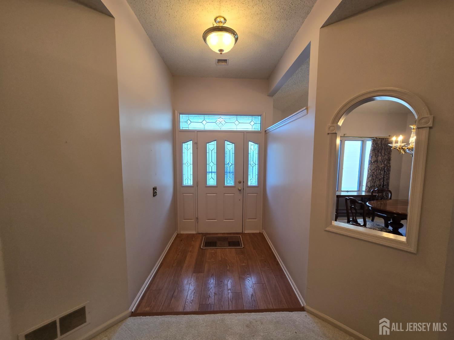 133 Chichester Road Monroe Township, NJ 08831 - Photo 11 of 25 a view of entryway with wooden floor