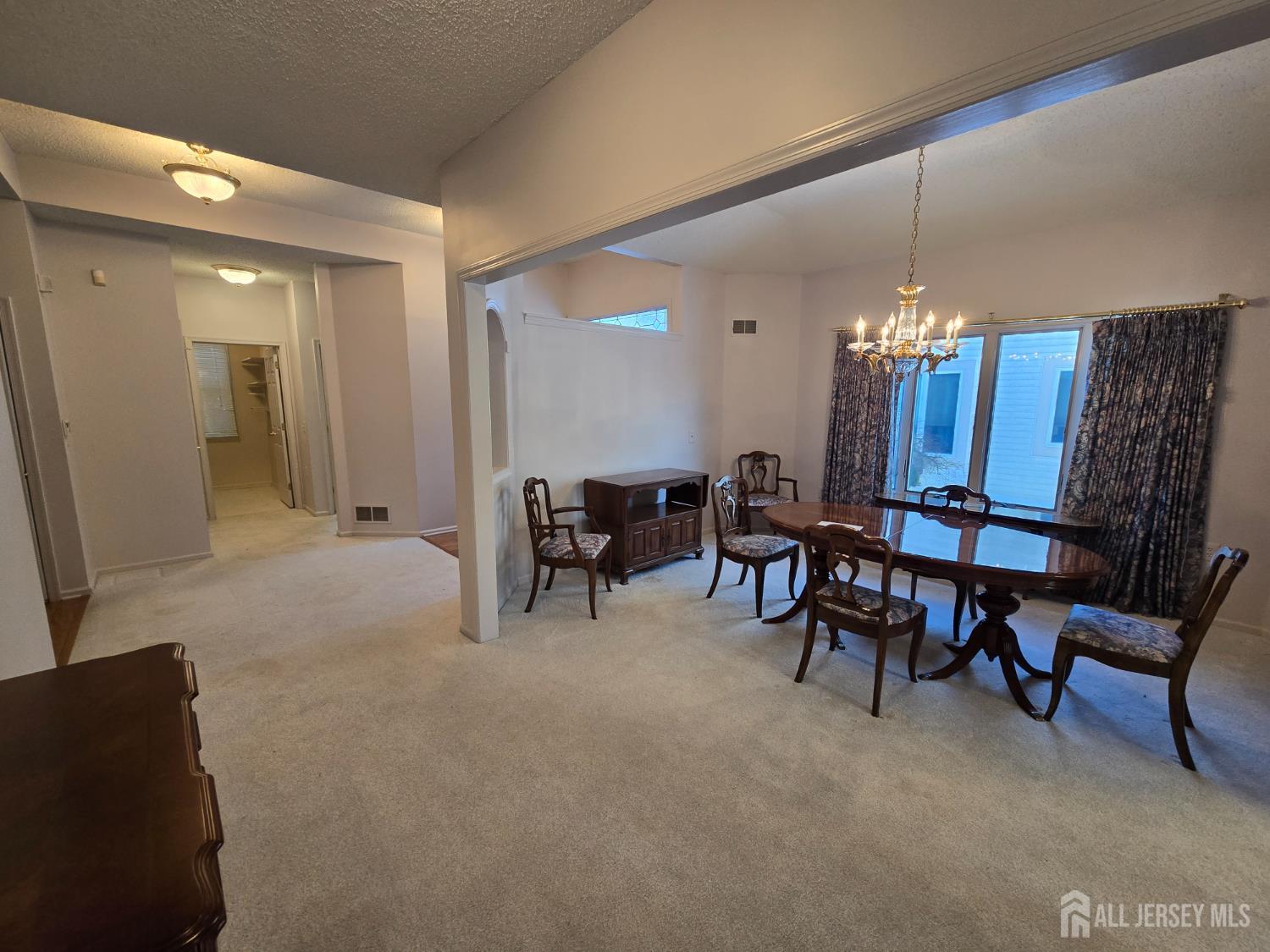 133 Chichester Road Monroe Township, NJ 08831 - Photo 15 of 25 a view of a livingroom and dining room