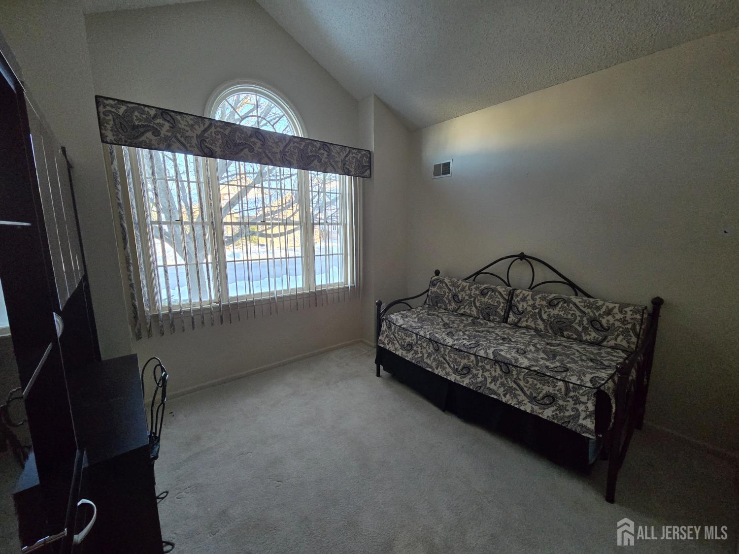 133 Chichester Road Monroe Township, NJ 08831 - Photo 17 of 25 a bedroom with a bed next to a window
