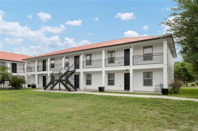 a house view with a garden space
