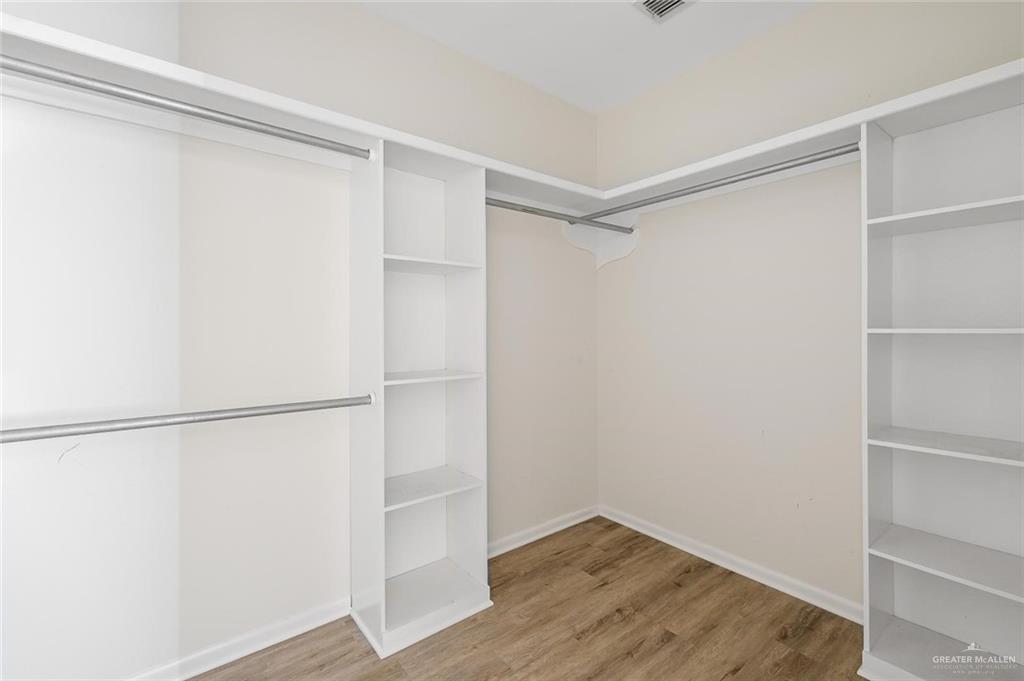 1105 West Stubbs Street, Unit 4 Edinburg, TX 78539 - Photo 9 of 12 a view of an empty walk in closet