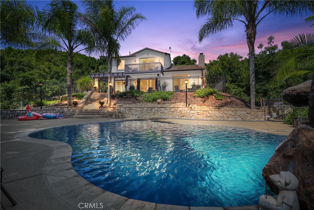 32840 Lilac Road Valley Center, CA 92082 - Photo 1 of 1 a view of a town with palm trees