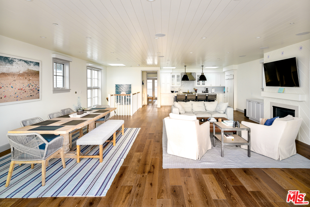 703 Bayview Drive Manhattan Beach, CA 90266 - Photo 2 of 24 a living room with fireplace furniture and a flat screen tv