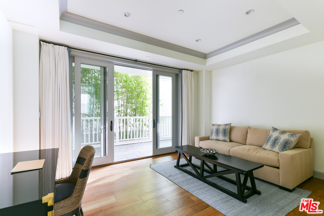 703 Bayview Drive Manhattan Beach, CA 90266 - Photo 15 of 24 a living room with furniture and a window