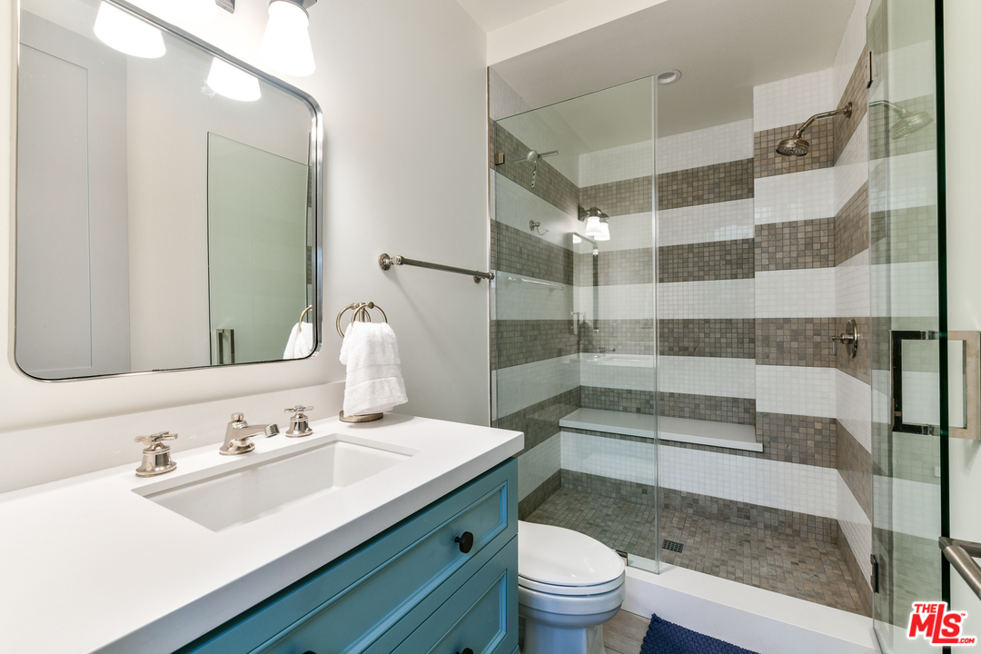 703 Bayview Drive Manhattan Beach, CA 90266 - Photo 17 of 24 a bathroom with a sink toilet and shower