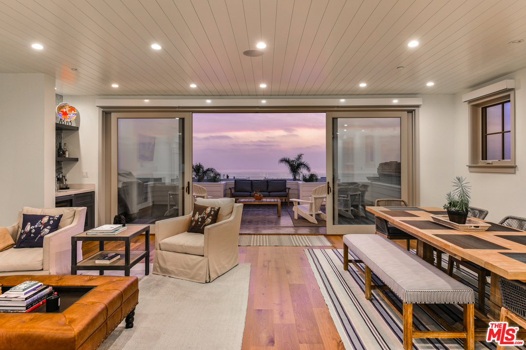 703 Bayview Drive Manhattan Beach, CA 90266 - Photo 4 of 24 a living room with furniture and a table