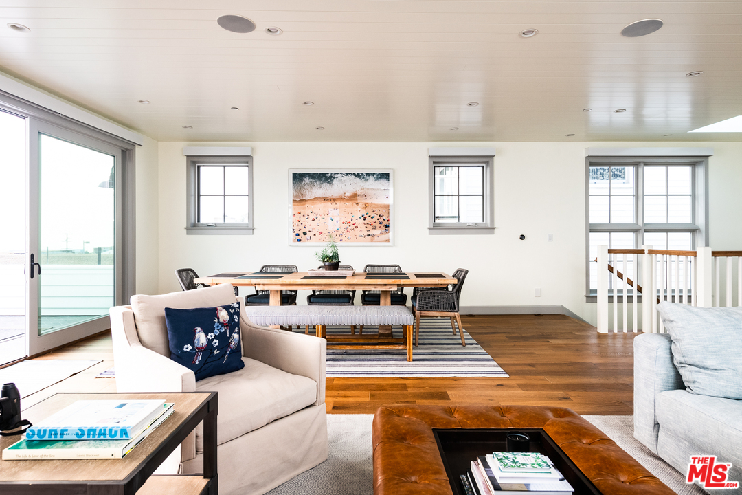703 Bayview Drive Manhattan Beach, CA 90266 - Photo 7 of 24 a living room with furniture and a large window