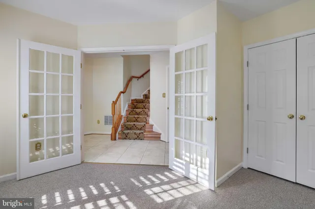 an empty room with windows