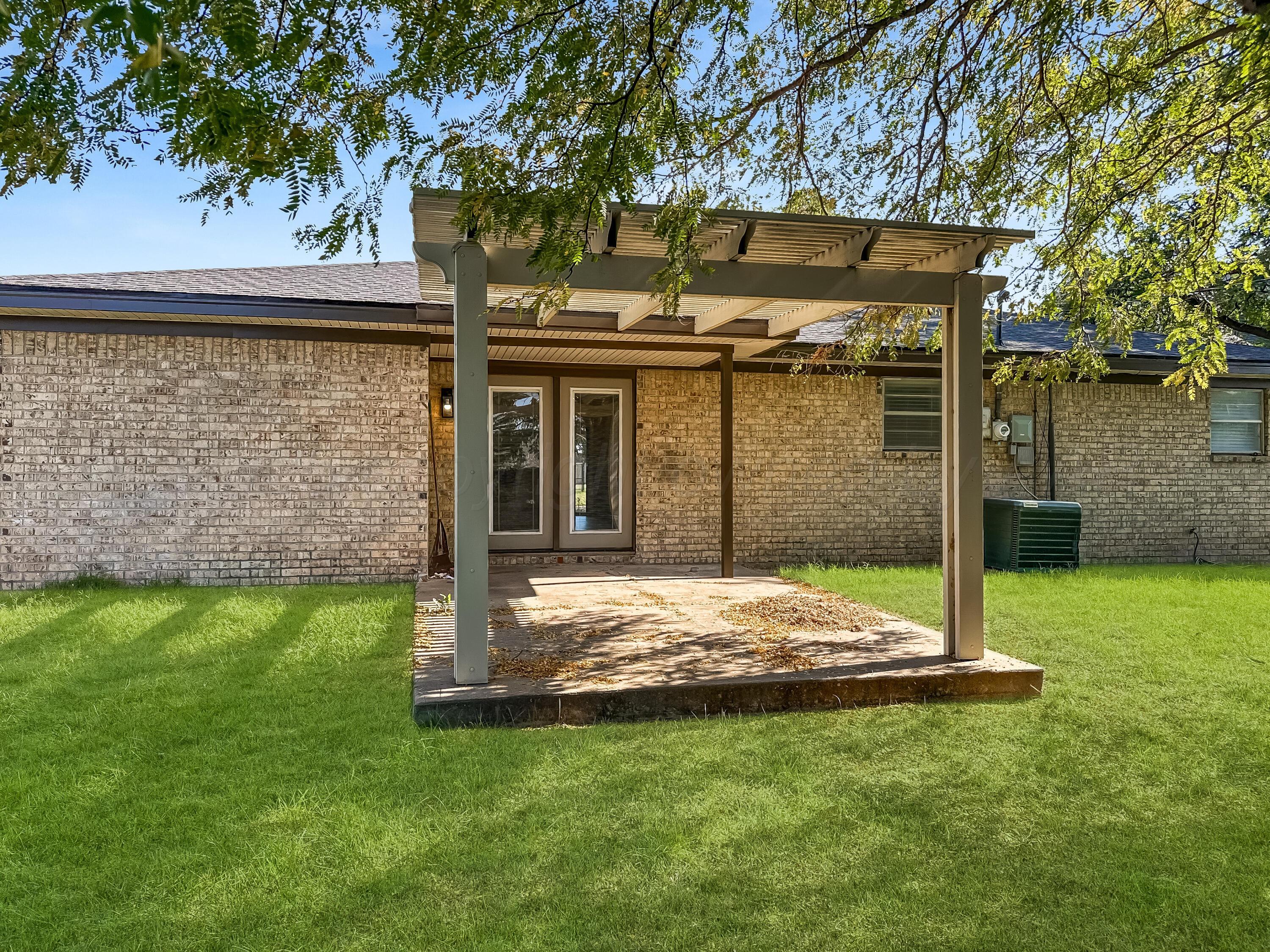 216 Skycrest Street Borger, TX 79007 - Photo 18 of 20 a view of back yard of the house
