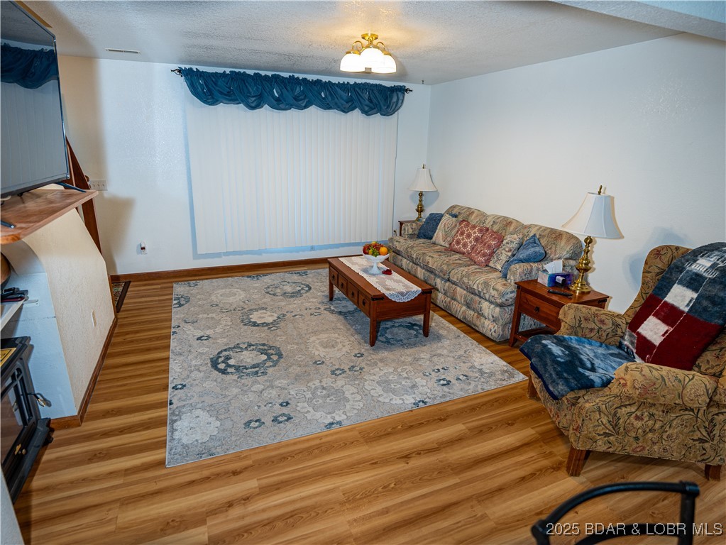 1070 Old Nonsuch Road Camdenton, MO 65020 - Photo 26 of 46 Pleasant living room