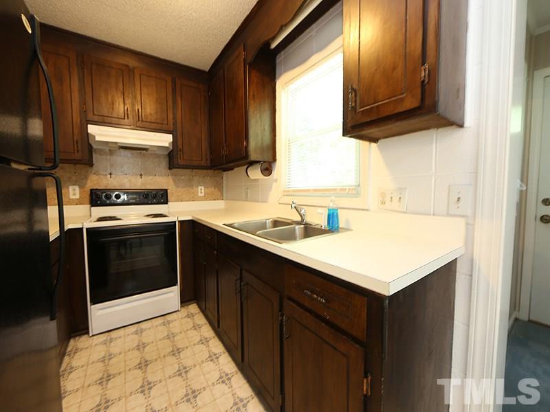 2685 John Adams Road Willow Spring, NC 27592 - Photo 12 of 25 Good amount of counterspace!