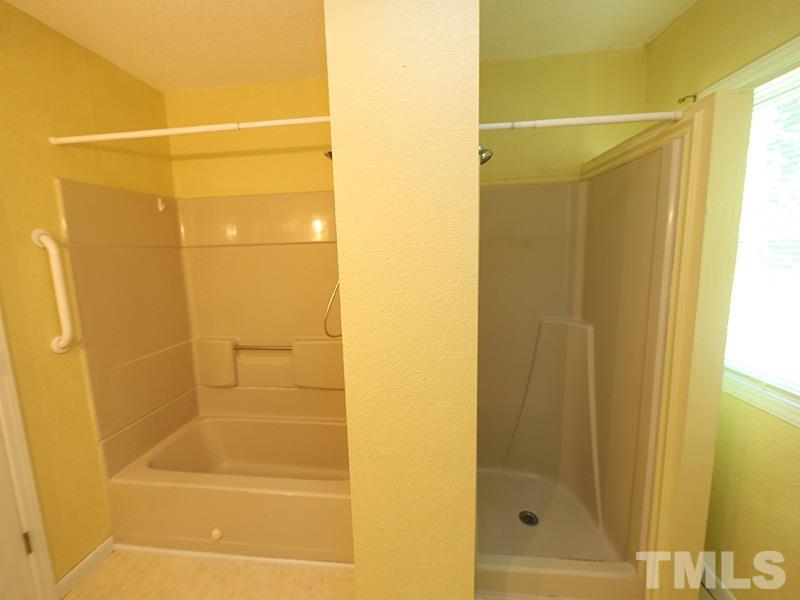 2685 John Adams Road Willow Spring, NC 27592 - Photo 18 of 25 Full bath with tub and separate shower!