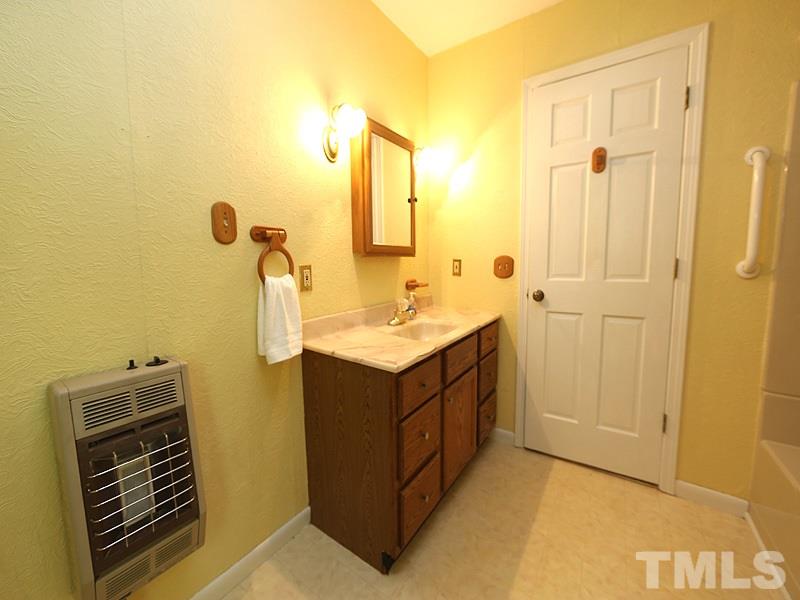 2685 John Adams Road Willow Spring, NC 27592 - Photo 19 of 25 Hall bath!
