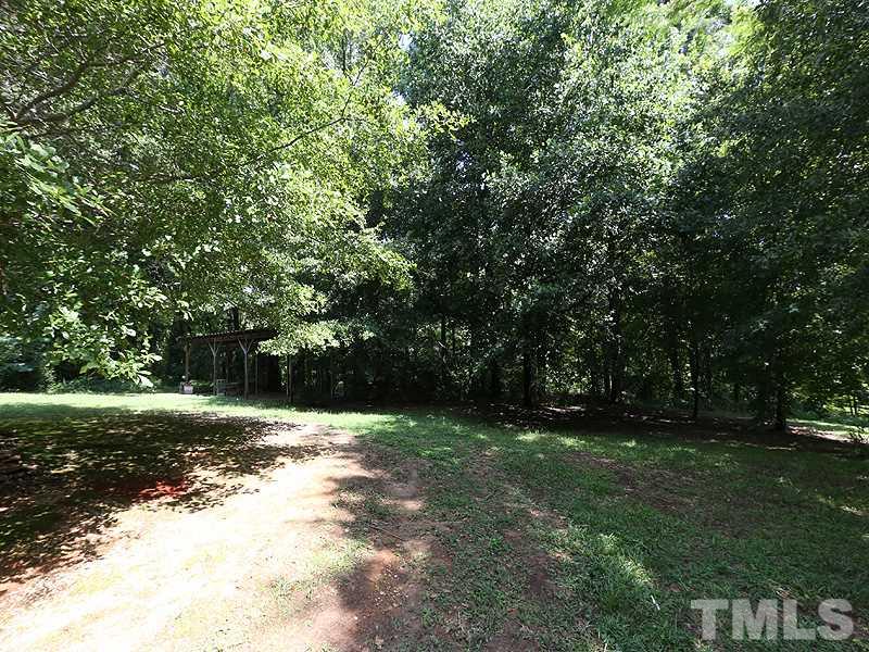 2685 John Adams Road Willow Spring, NC 27592 - Photo 20 of 25 Lovely yard!