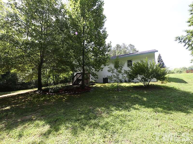 2685 John Adams Road Willow Spring, NC 27592 - Photo 23 of 25 Nice big yard!