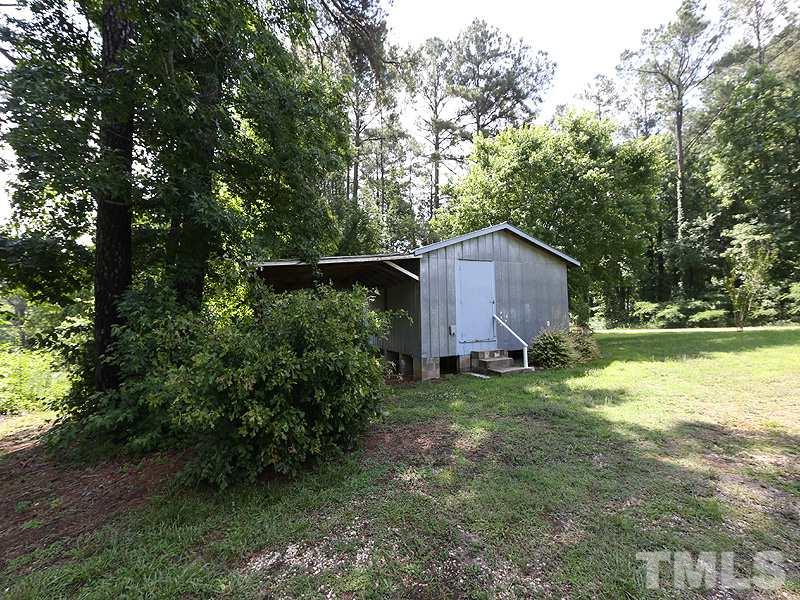 2685 John Adams Road Willow Spring, NC 27592 - Photo 24 of 25 20x20 storage shed with lean to!
