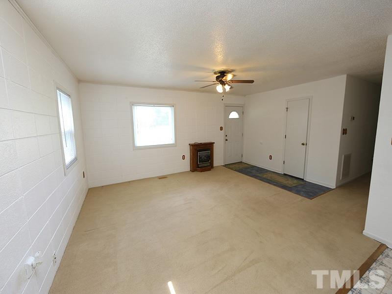 2685 John Adams Road Willow Spring, NC 27592 - Photo 6 of 25 Large family room!