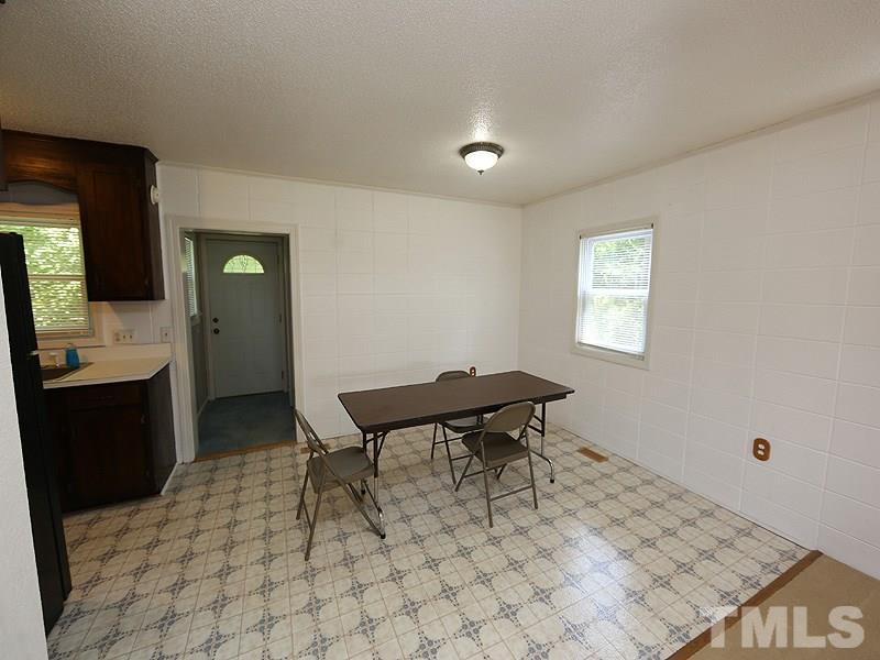 2685 John Adams Road Willow Spring, NC 27592 - Photo 9 of 25 Dining room open to the kitchen!