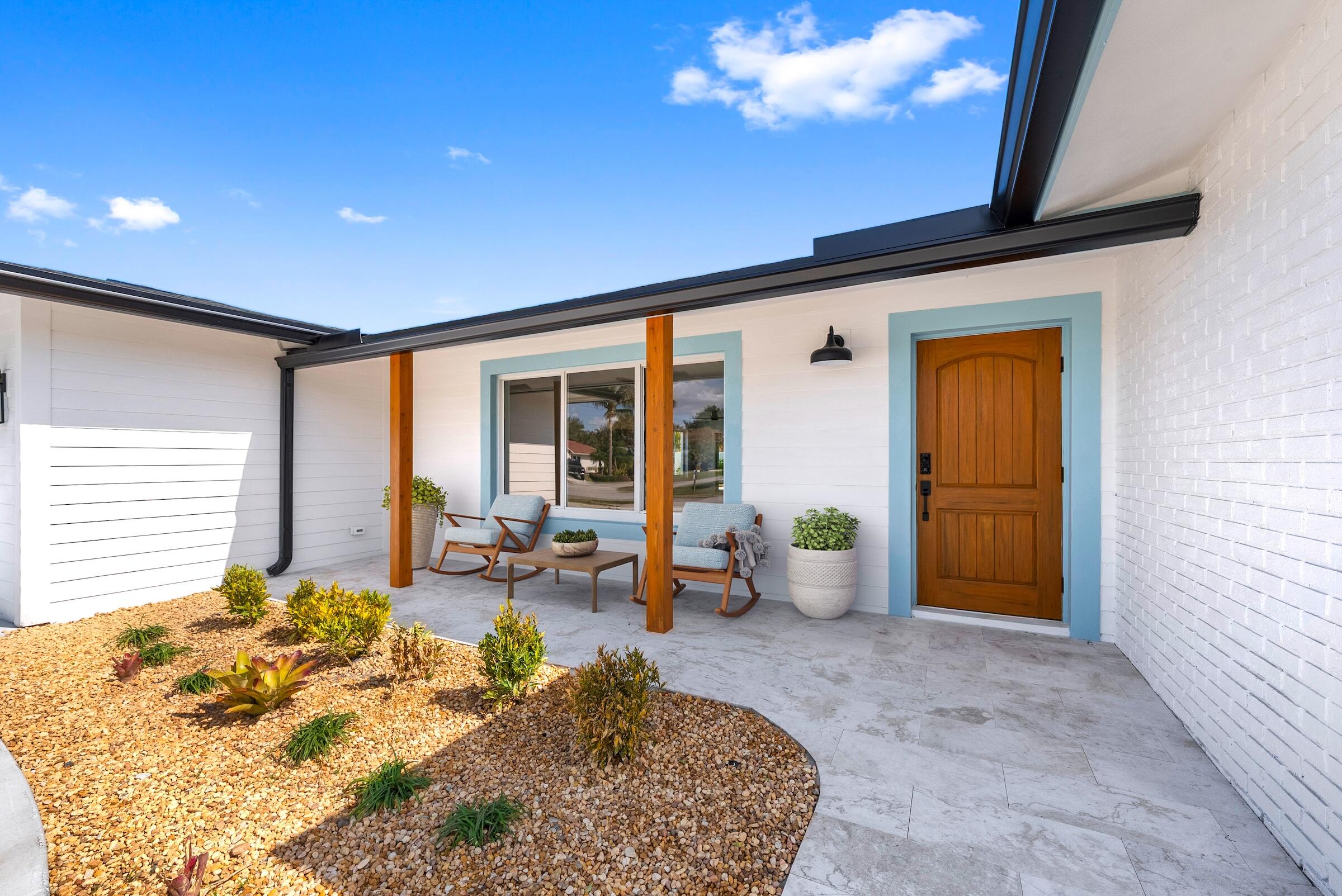 1607 Seabrook Road Jupiter, FL 33469 - Photo 30 of 62 Covered Porch