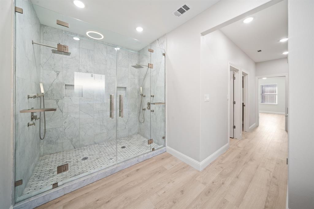 8809 Isom Lane Dallas, TX 75249 - Photo 22 of 40 a bathroom with a shower