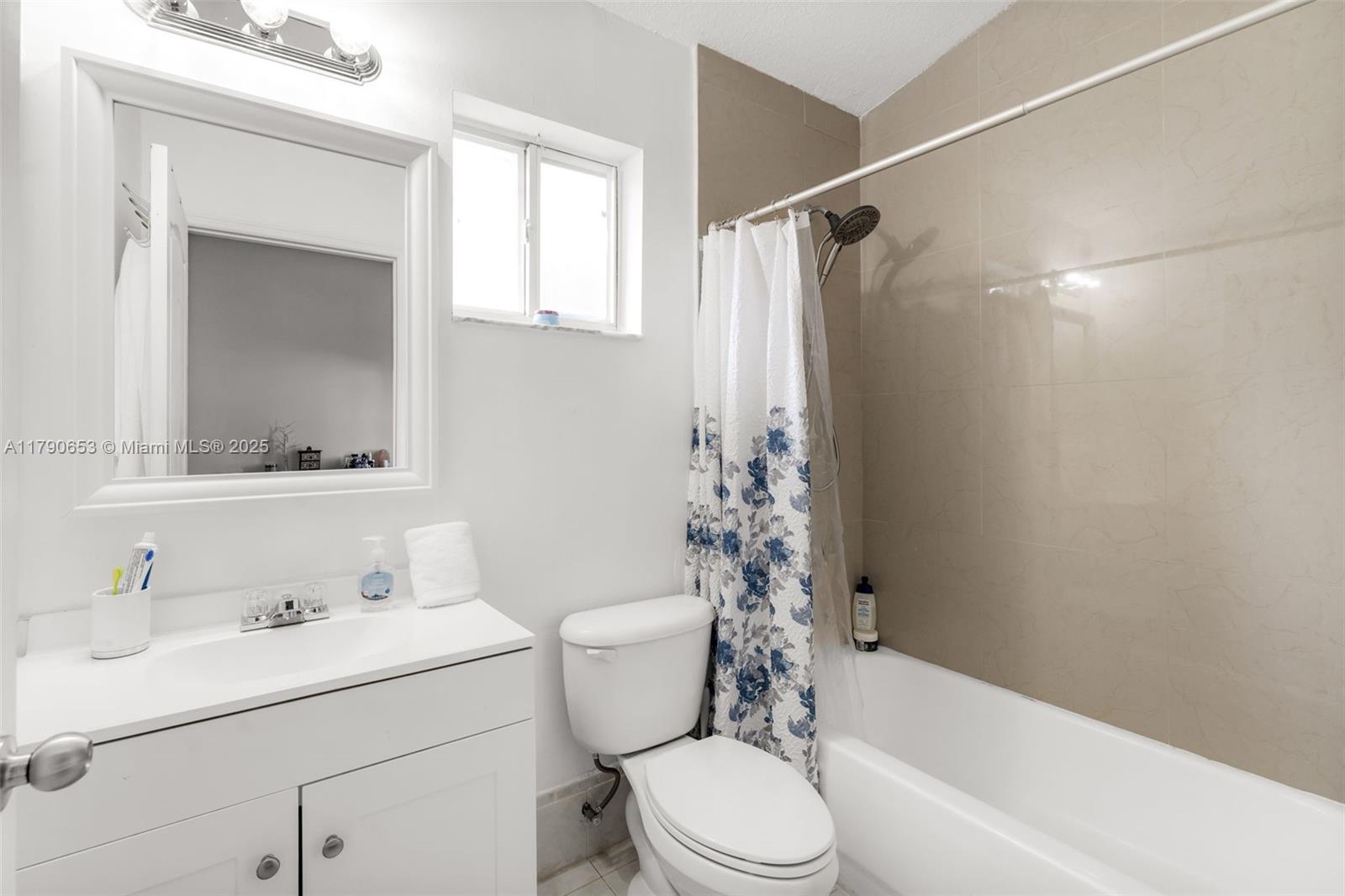 17834 Southwest 144th Court Miami, FL 33177 - Photo 11 of 23 a bathroom with a sink toilet and shower