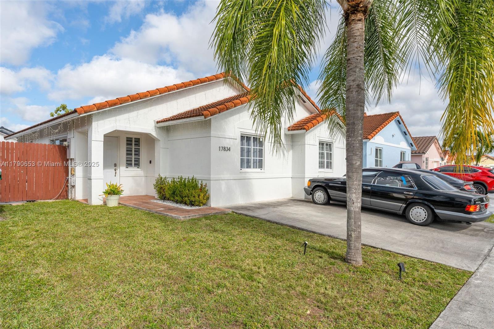 17834 Southwest 144th Court Miami, FL 33177 - Photo 3 of 23 a view of a house with a patio