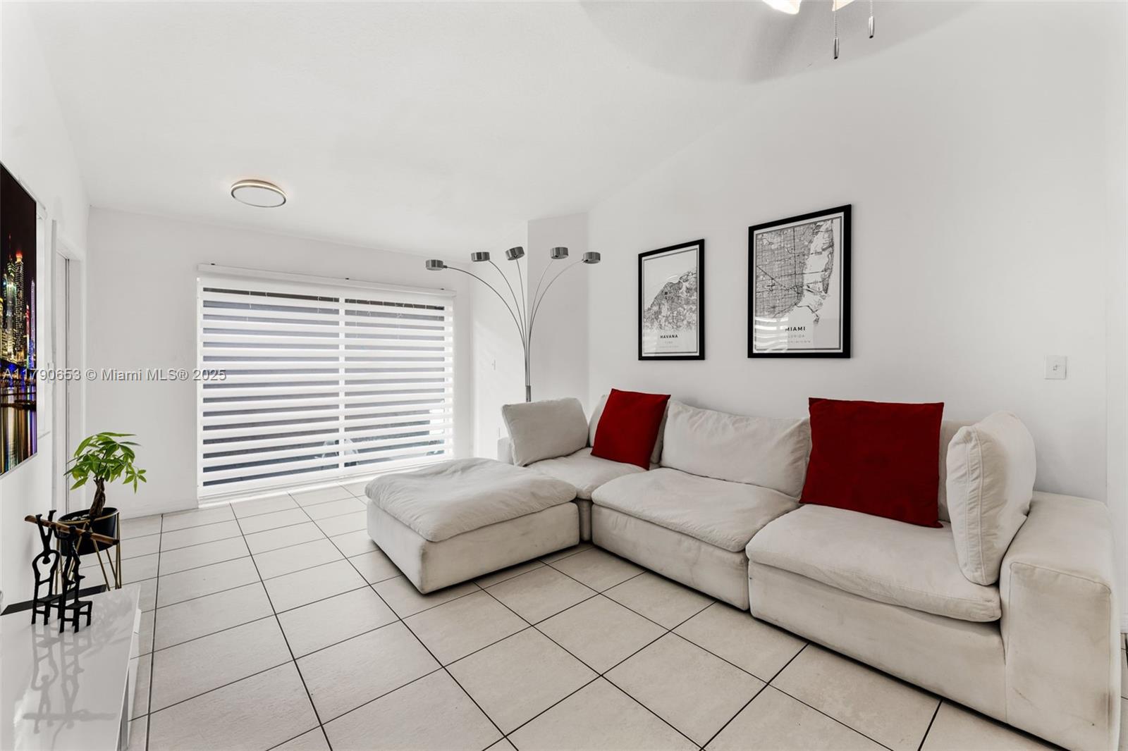 17834 Southwest 144th Court Miami, FL 33177 - Photo 6 of 23 a living room with furniture and a potted plant