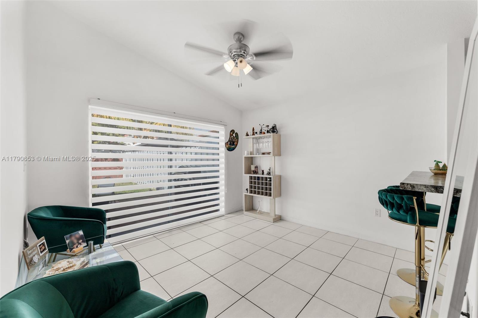 17834 Southwest 144th Court Miami, FL 33177 - Photo 7 of 23 a bedroom with furniture and a window
