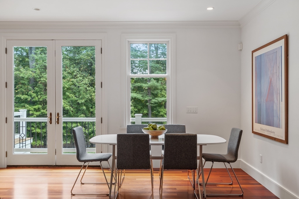 168 Nashawtuc Road Concord, MA 01742 - Photo 11 of 42 a view of a dining room with furniture window and outside view