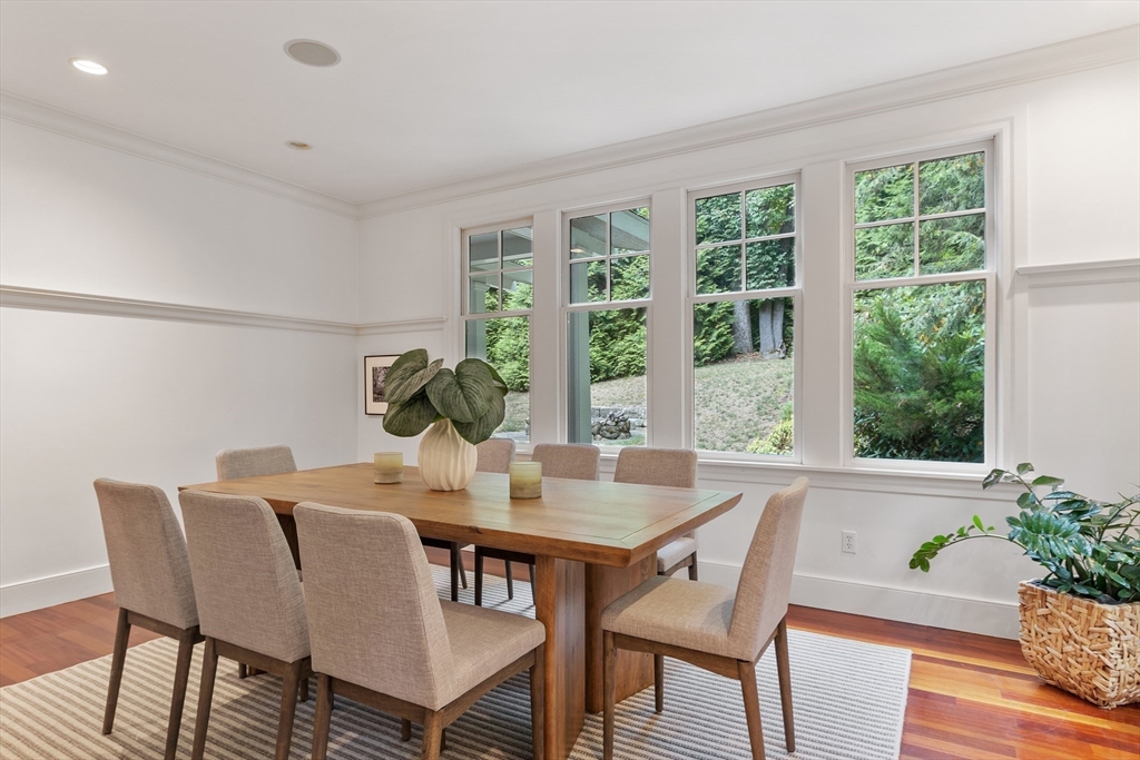 168 Nashawtuc Road Concord, MA 01742 - Photo 14 of 42 a view of a dining room with furniture window and outside view