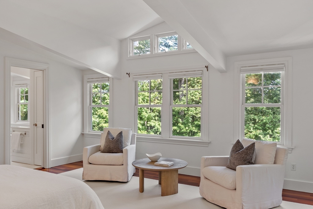 168 Nashawtuc Road Concord, MA 01742 - Photo 26 of 42 a living room with furniture and a large window